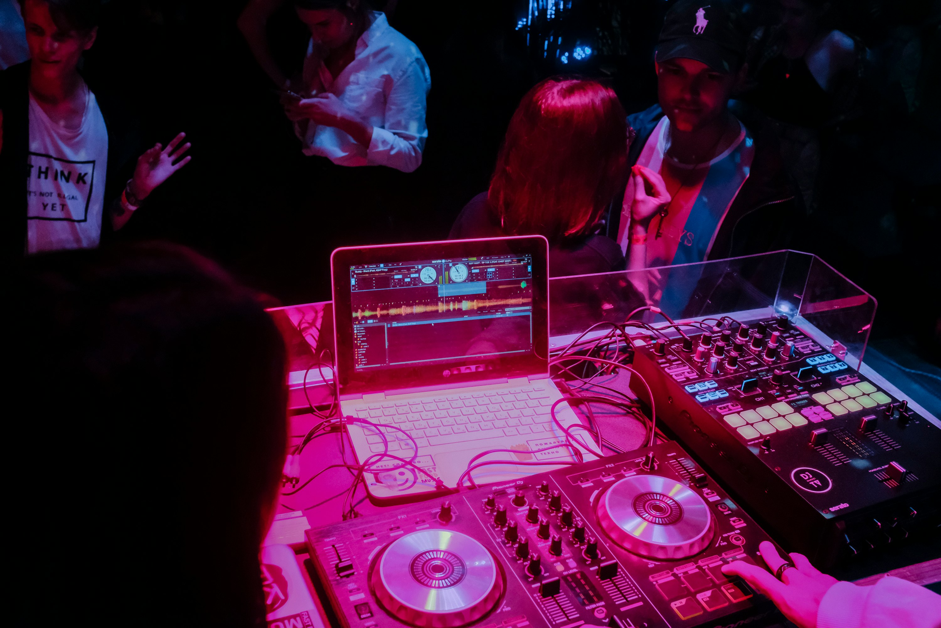 white laptop and audio system